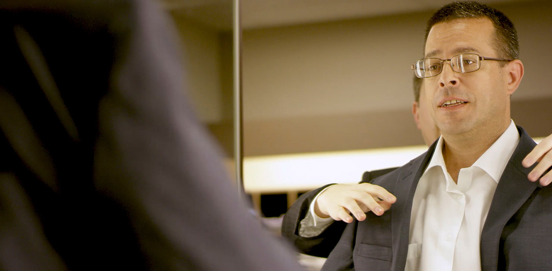 Suit Drive recipient being fitted for a suit