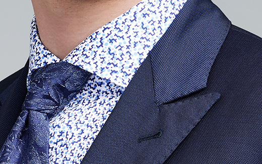 navy blue suit with peaked lapels