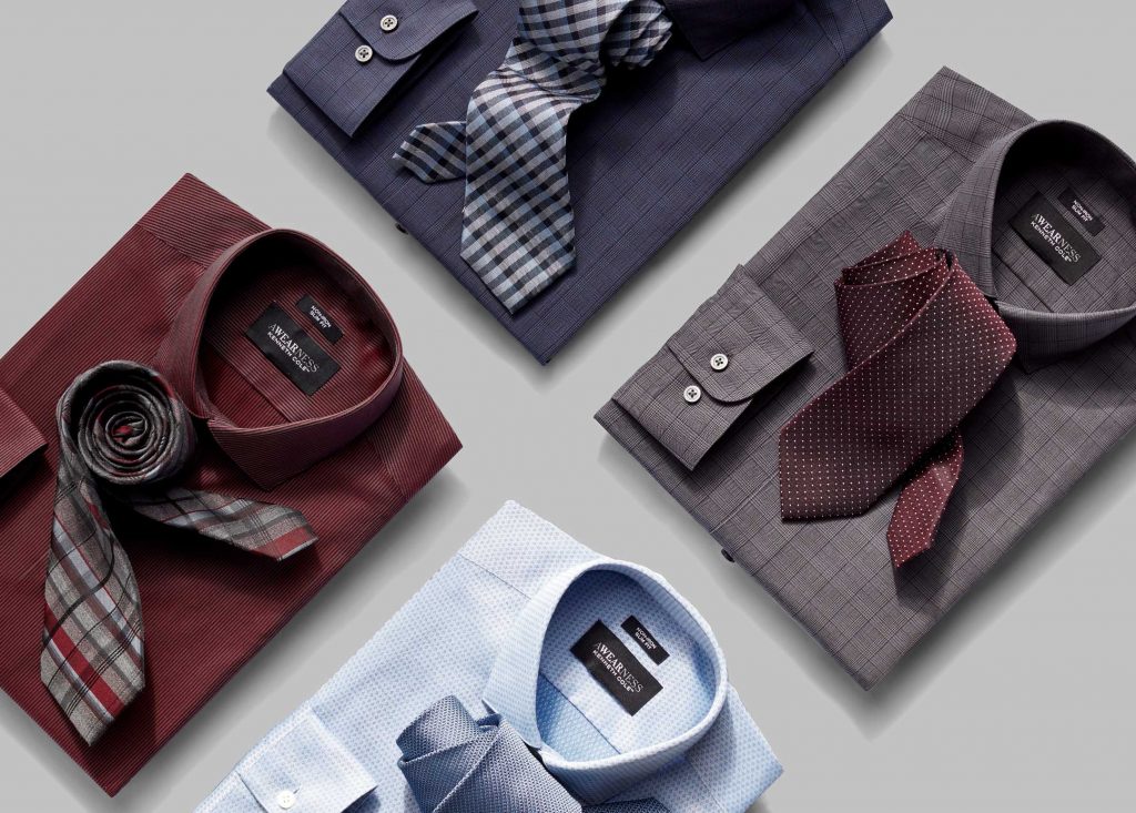 Four dress shirts paired with ties.